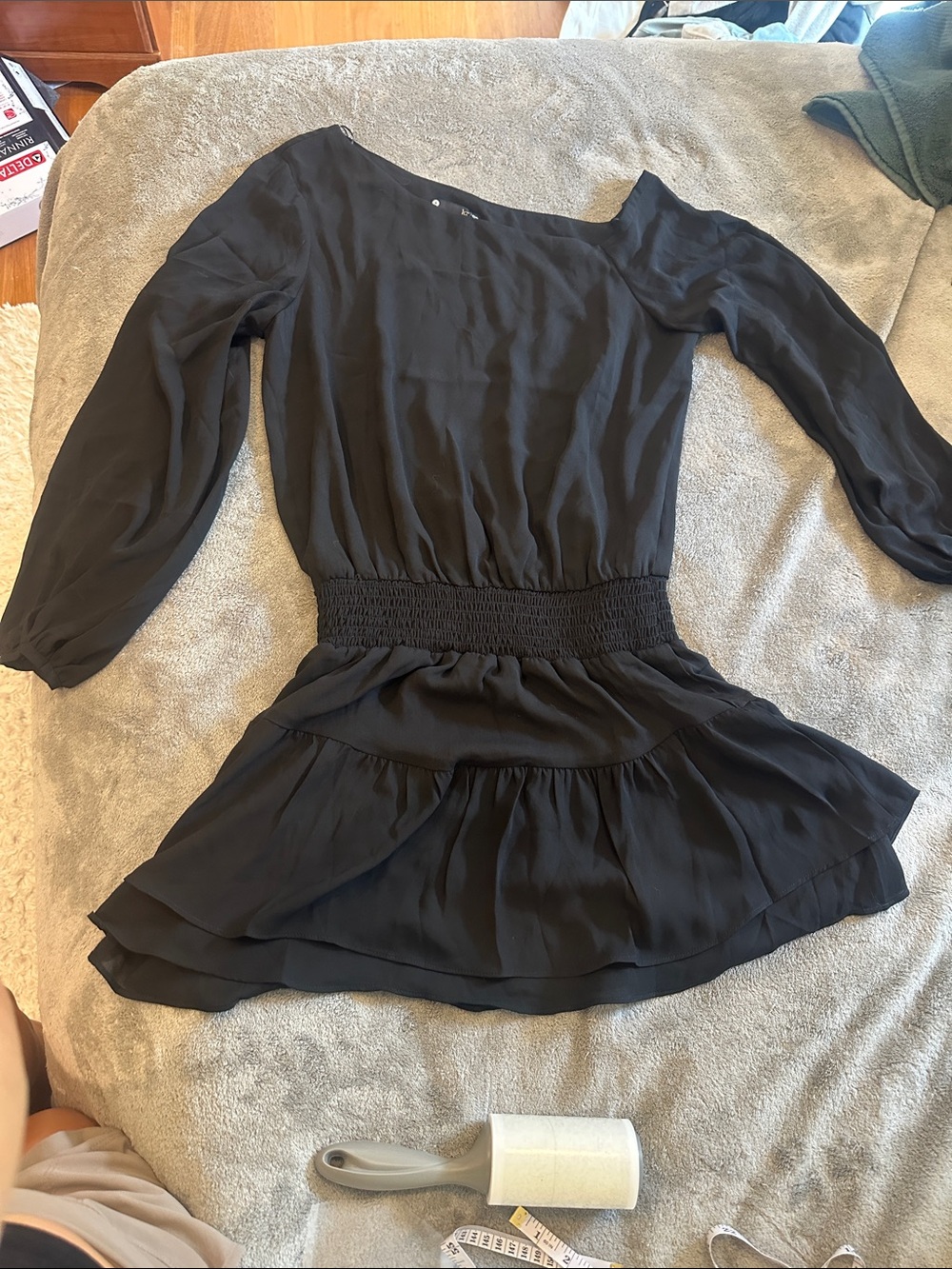Krisa Off shoulder Black smocked mini dress